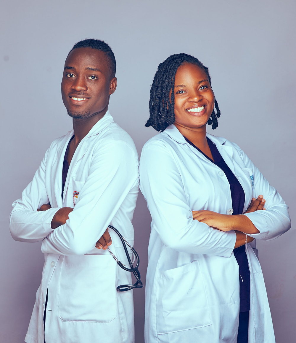 Two medical students in white coats.